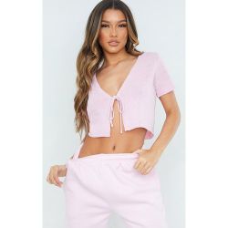 Gilet court rose tendre en maille tricot noué devant à manches courtes - PrettyLittleThing - Modalova