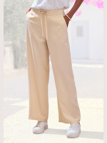 Pantalon tailleur poches fendues pratiques - LASCANA - Modalova