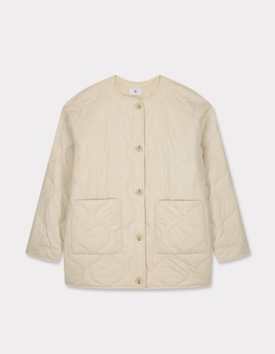 Veste matelassé col rond - beige - celio - Modalova