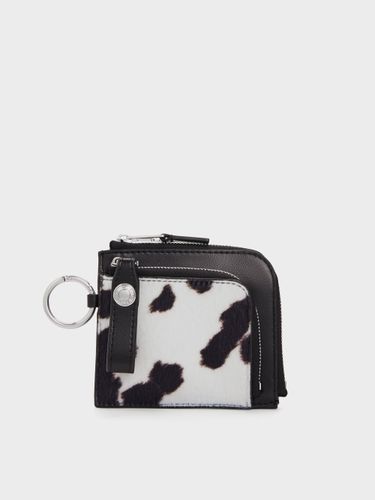 Charles & Keith - Pochette zippée Vega imprimé vache effet poulain - Charles & Keith - Modalova