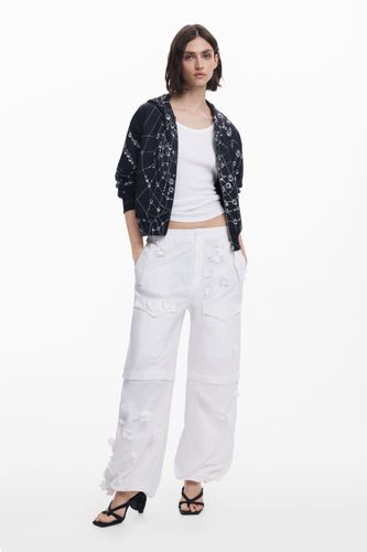 Pantalon convertible à fleurs Tyler McGillivary - Desigual - Modalova
