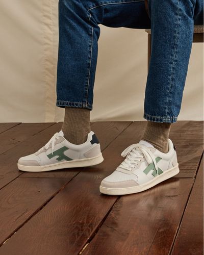 Baskets blanches & bleu marine - FAGUO - Modalova