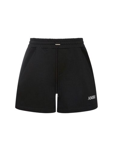 Short De Bain En Textile Technique Imprimé Logo - AMIRI - Modalova