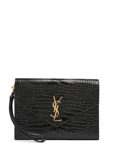 Pochette En Cuir Embossé Cassandre - SAINT LAURENT - Modalova