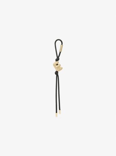 MK Breloque de sac initiale dorée avec cordon moucheté - Michael Kors - MICHAEL Michael Kors - Modalova