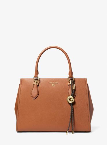 MK Breloque de sac initiale dorée avec cordon moucheté - Michael Kors - MICHAEL Michael Kors - Modalova