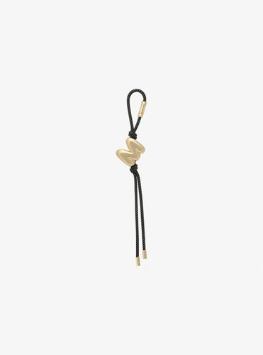 MK Breloque de sac initiale dorée avec cordon moucheté - Michael Kors - MICHAEL Michael Kors - Modalova