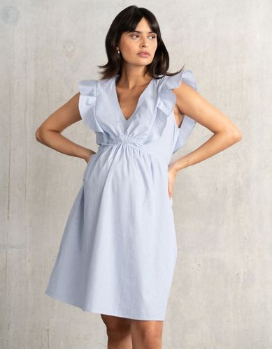 Robe de maternité rayée avec patte de boutonnage et détails volantés - Seraphine - Modalova