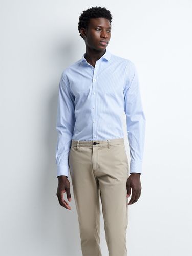 Chemise extra-slim stretch rayée - Devred - Modalova