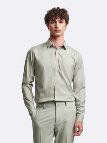 Chemise extra-slim sans repassage unie - Devred - Modalova
