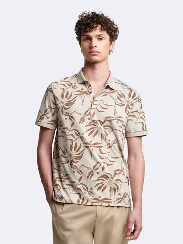 Polo manches courtes en coton fleuri - Devred - Modalova
