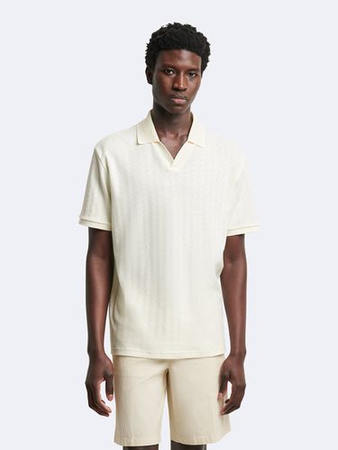 Polo manches courtes en coton à motif - Devred - Modalova