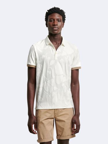 Polo manches courtes en coton à motifs - Devred - Modalova