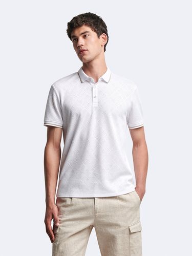 Polo manches courtes en coton à relief - Devred - Modalova