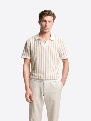 Polo col ouvert en maille rayée - Devred - Modalova