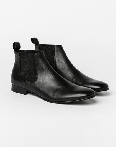 Boots Chelsea cuir noir - IZAC - Modalova