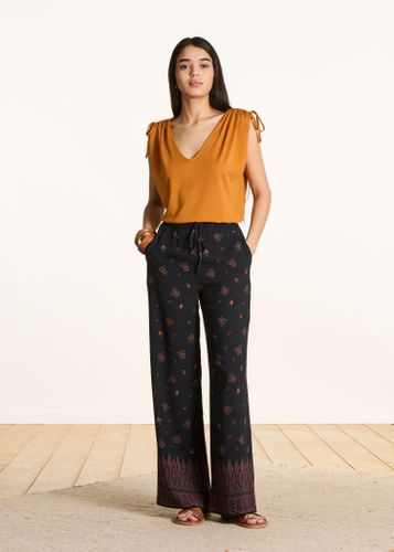 Pantalon large noir à imprimé - La Fée Maraboutée - Modalova
