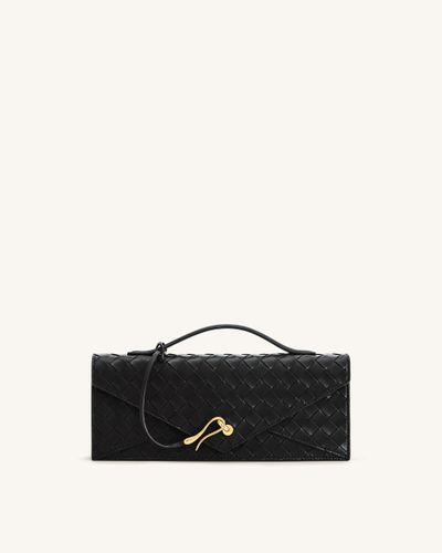 Celeste Sac à main enveloppe à anse supérieure, à texture tissée - Noir - JW PEI - Modalova