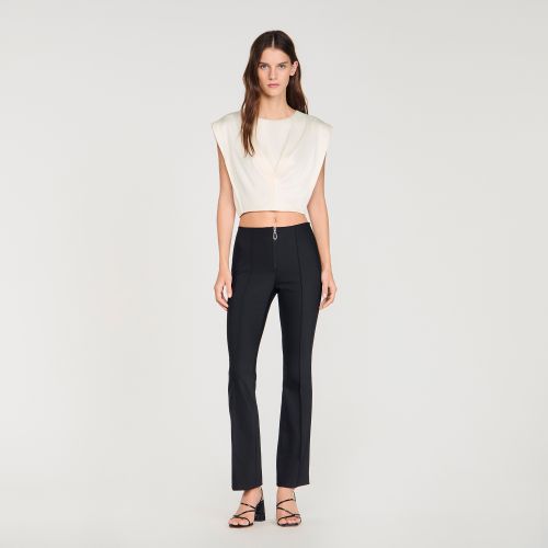 Pantalon à plis et zip - Sandro Paris - Modalova
