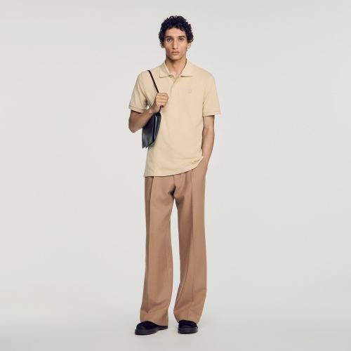Polo en coton à logo cuir - Sandro Paris - Modalova
