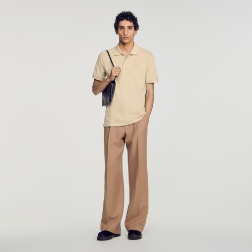 Polo en coton à logo cuir - Sandro Paris - Modalova