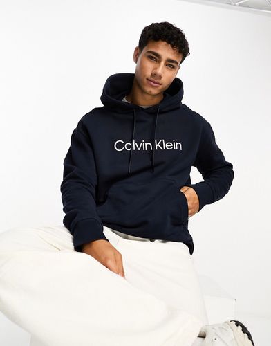 Hero - Sweat à capuche confort à logo - Calvin Klein - Modalova