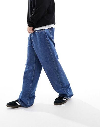 Jean ample style années 90 - moyen délavé - Calvin Klein Jeans - Modalova