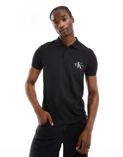 Polo à logo monogramme - Calvin Klein Jeans - Modalova