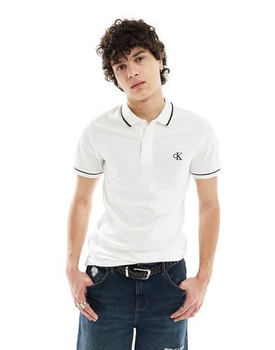 Polo slim à liseré - Calvin Klein Jeans - Modalova