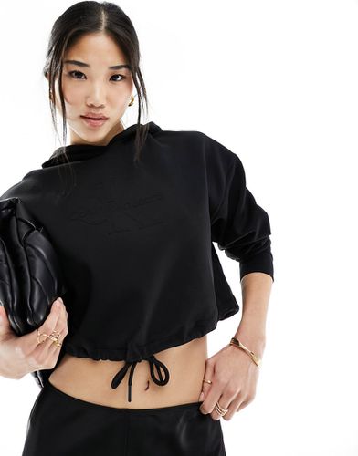 Jeans - Sweat à capuche à logo - Calvin Klein - Modalova