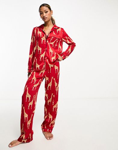 Pyjama de Noël avec pantalon et top manches longues en satin imprimé girafe - Chelsea Peers - Modalova