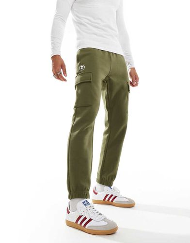 AAPE By A Bathing Ape - Pantalon de jogging style cargo à logo et chevilles resserrées - Kaki - Aape By A Bathing Ape® - Modalova