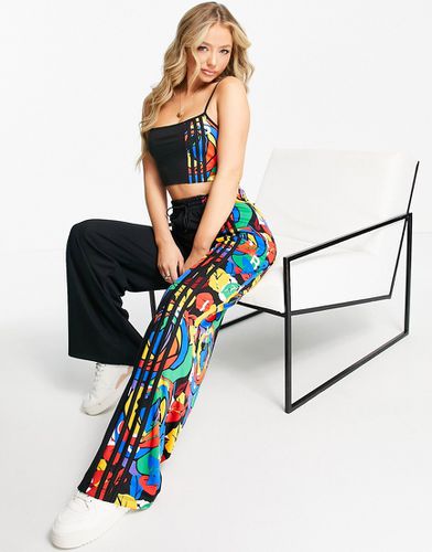 X Rich Mnisi - Pantalon large à fleurs - adidas Originals - Modalova