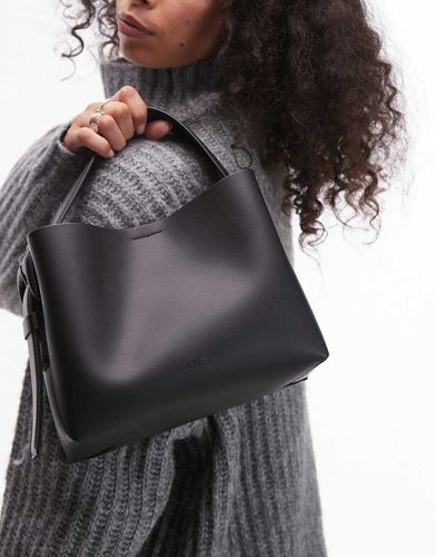 Sac bandoulière en cuir avec boucle sur le côté - Arket - Modalova