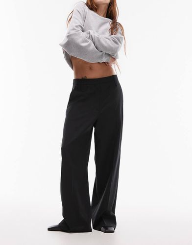 Pantalon droit stretch en laine mélangée à plis plats sur le devant - Arket - Modalova