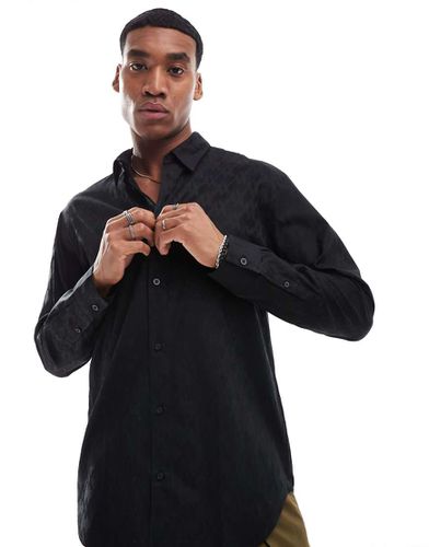 Chemise à manches longues en satin brillant avec logo sur l'ensemble - Armani Exchange - Modalova