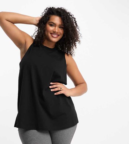 Curve - Débardeur en coton à séchage rapide à emmanchures basses avec logo - Asos 4505 - Modalova