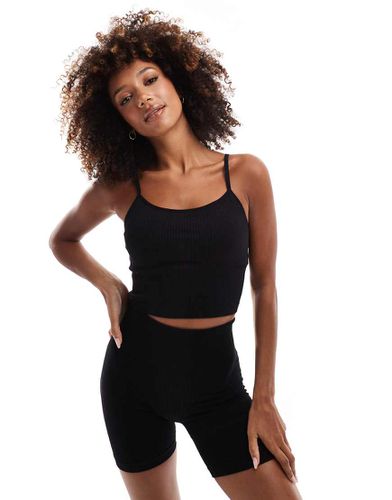 Débardeur de yoga côtelé emblématique sans coutures et brassière intégrée - Asos 4505 - Modalova