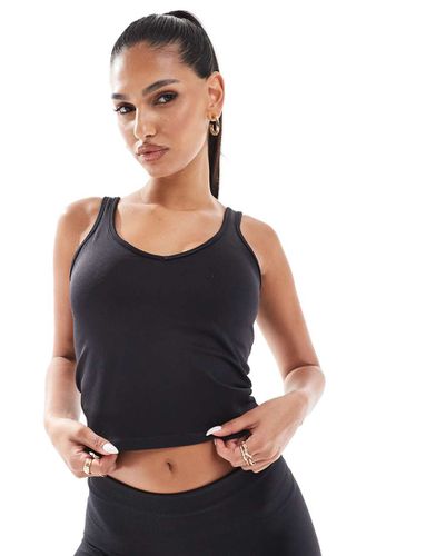 Débardeur de sport sans coutures avec col V et soutien-gorge intégré - Asos 4505 - Modalova