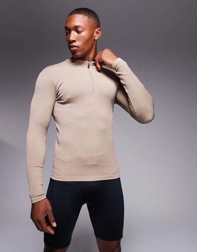 Icon - Top de sport moulant sans coutures à manches longues et col zippé en maille côtelée - Taupe - Asos 4505 - Modalova