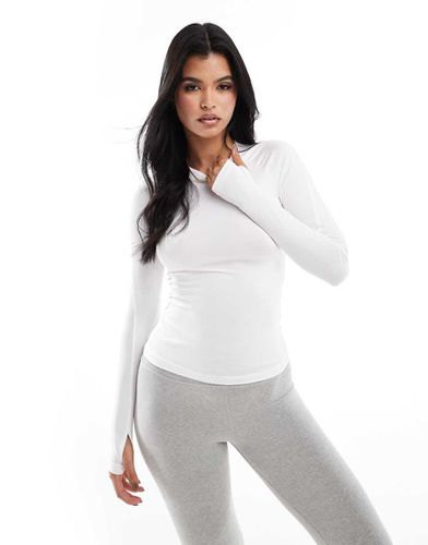 Icon - Top de sport ajusté à manches longues - Asos 4505 - Modalova