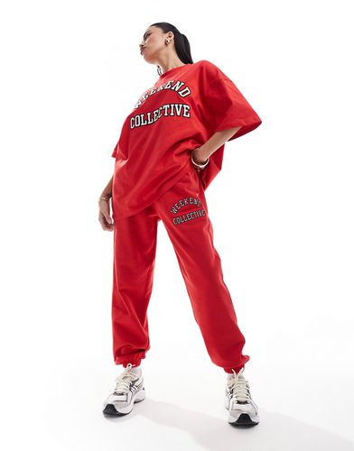 Pantalon de jogging oversize à logo style universitaire - Asos Weekend Collective - Modalova