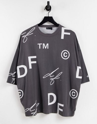 ASOS Dark Future - T-shirt oversize avec imprimé logo sur l'ensemble - ASOS DESIGN - Modalova
