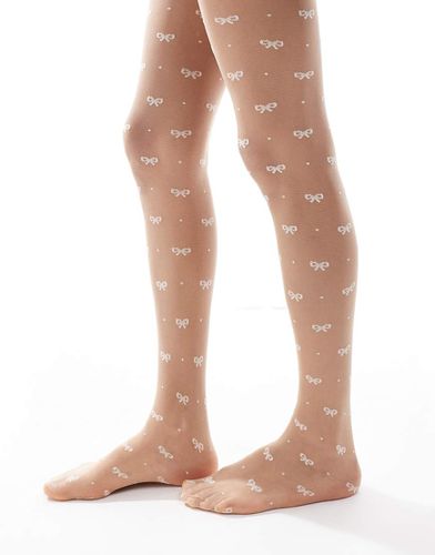 Collants plumetis à motif nauds - Asos Design - Modalova