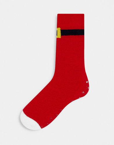 Chaussettes chaussons de Noël avec motif ceinture du Père Noël - Asos Design - Modalova