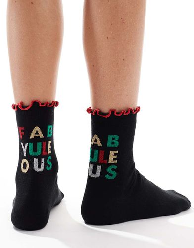 Chaussettes de Noël à slogan et bords volantés - Asos Design - Modalova