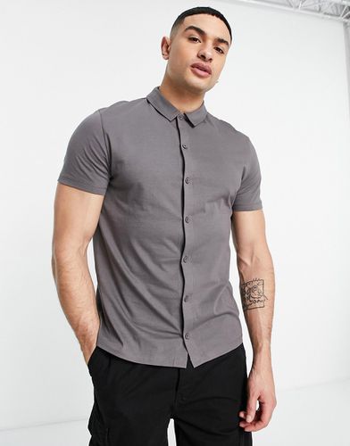 Chemise boutonnée en jersey - délavé - ASOS DESIGN - Modalova