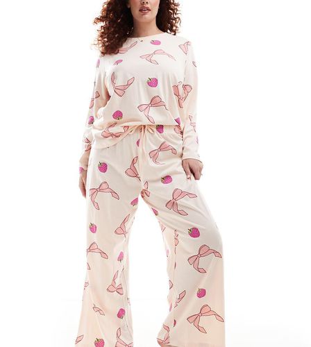 ASOS DESIGN Curve - Ensemble de pyjama top manches longues et pantalon avec détail naud et fruit - Asos Curve - Modalova