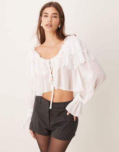 Blouse à volants en dentelle et tissu plumetis avec liens devant - Ivoire - Asos Design - Modalova