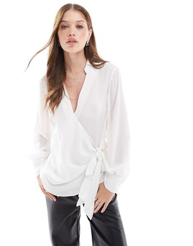 Blouse cache-caur à manches longues avec décolleté plongeant - Ivoire - Asos Design - Modalova